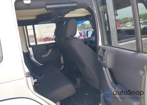 2015 Jeep Wrangler Unlimited Sport z USA, uszkodzony, nr VIN 1C4BJWDG8FL585126